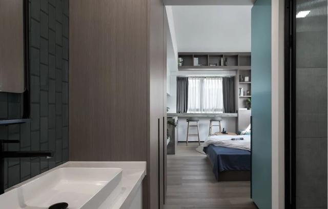 酒店公寓裝修效果圖(35㎡酒店式開間單身公寓，半平米都沒浪費，還裝得很有檔次)(圖2)